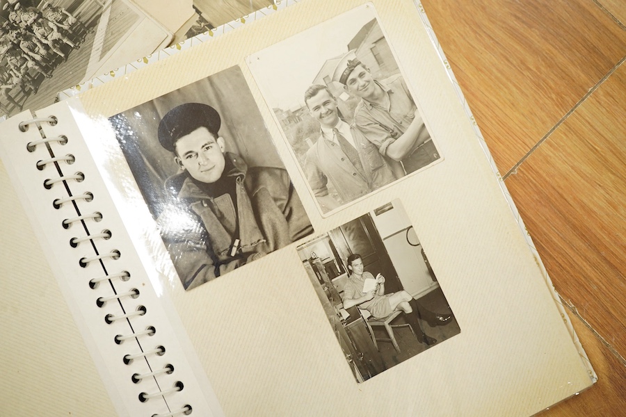 Two photograph albums containing an archive of WWII photos mainly of the RAF in Japan and the Far East, including a number of photos of RAF aircraft, aircraft carriers, Royal Naval ships, photographs of crew, military so